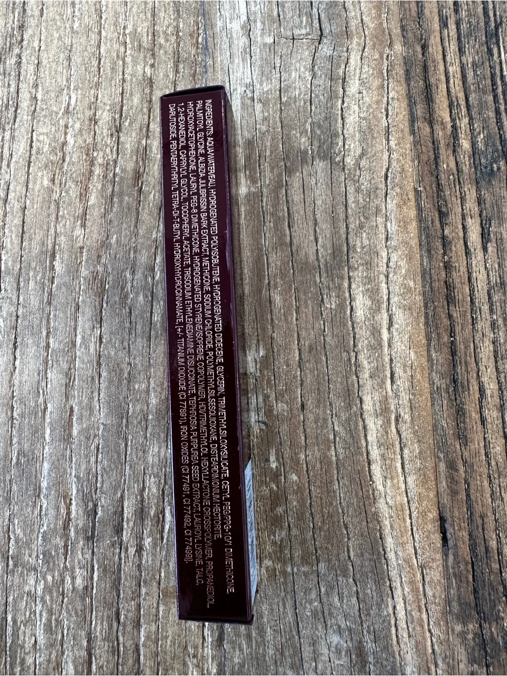 Charlotte Tilbury Liquid Concealer in Deep Burgundy Packaging